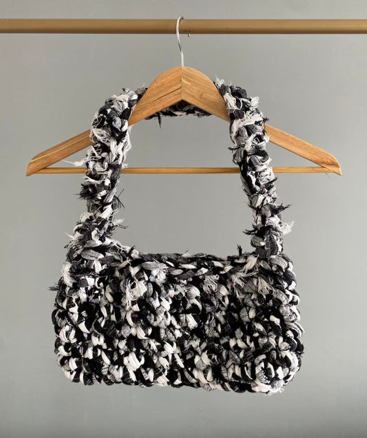 Sac à main noir et blanc marbré